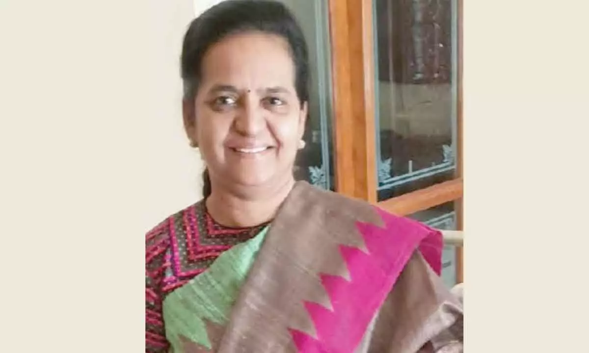 SPMVV Registrar received ‘Women Academic Achiever’ Award