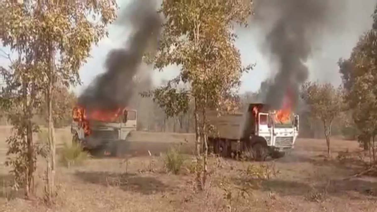 Naxalites burnt truck, poklen, road roller and water tanker