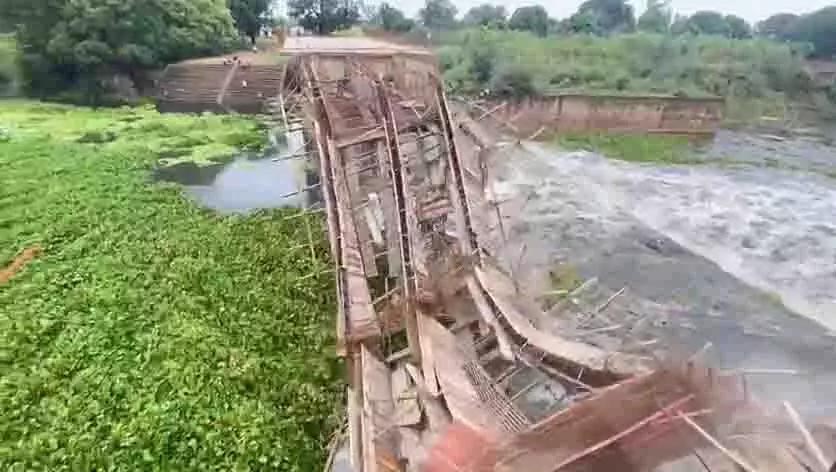 Structure erected to build a bridge washed away due to rising water level