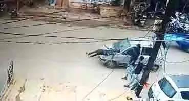 The car driver hit the young man, then the young friends thrashed the driver