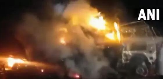 Truck stuck in railway gate caught fire